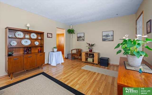 6070 Buckingham Ave, Omaha, NE 68117 - sitting room with light wood finished floors