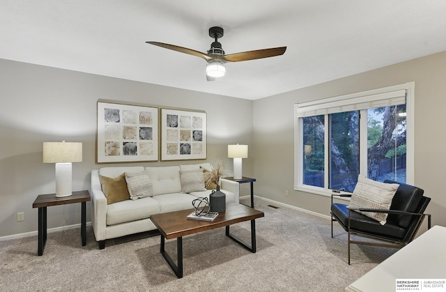 16712 V St, Omaha, NE 68135 - living area with a ceiling fan, light carpet, and baseboards