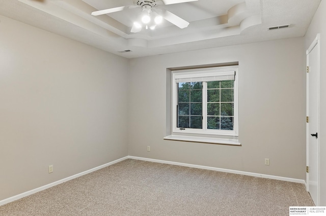 16712 V St, Omaha, NE 68135 - carpeted spare room featuring a tray ceiling, a ceiling fan, and baseboards