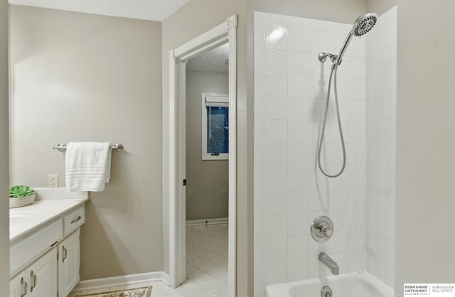 16712 V St, Omaha, NE 68135 - bathroom with vanity, shower / tub combination, and baseboards