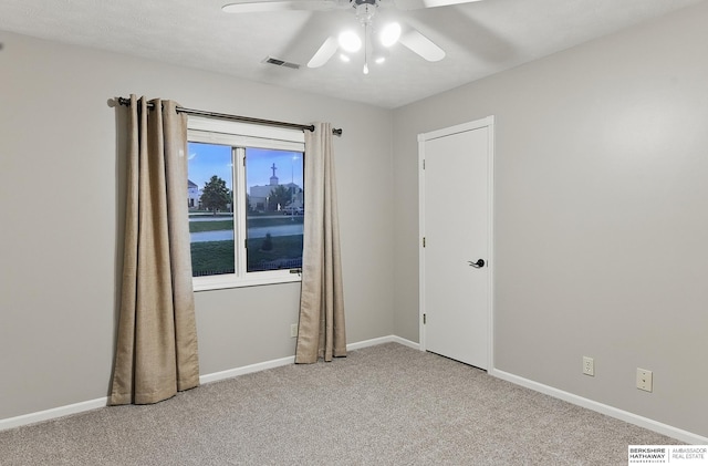 16712 V St, Omaha, NE 68135 - unfurnished room featuring a ceiling fan, carpet floors, and baseboards
