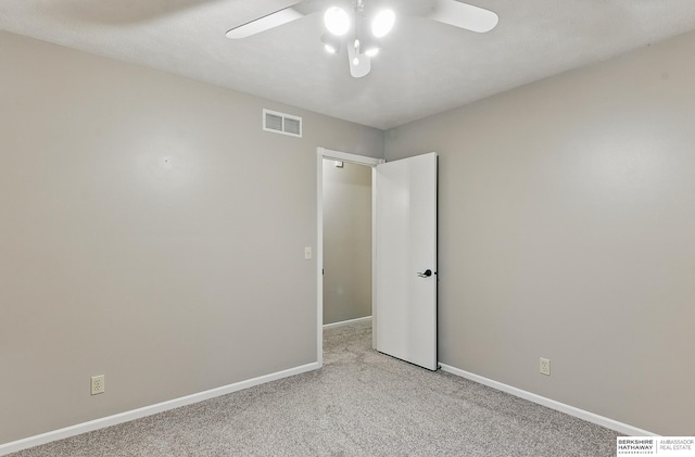 16712 V St, Omaha, NE 68135 - spare room with a ceiling fan, baseboards, and light carpet