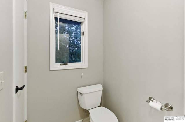 16712 V St, Omaha, NE 68135 - bathroom featuring toilet and baseboards