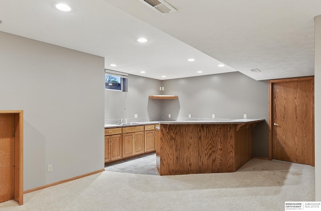 16712 V St, Omaha, NE 68135 - indoor wet bar featuring light carpet, recessed lighting, and baseboards