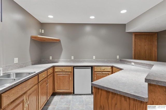 16712 V St, Omaha, NE 68135 - kitchen featuring a sink, brown cabinets, a peninsula, open shelves, and light tile patterned floors