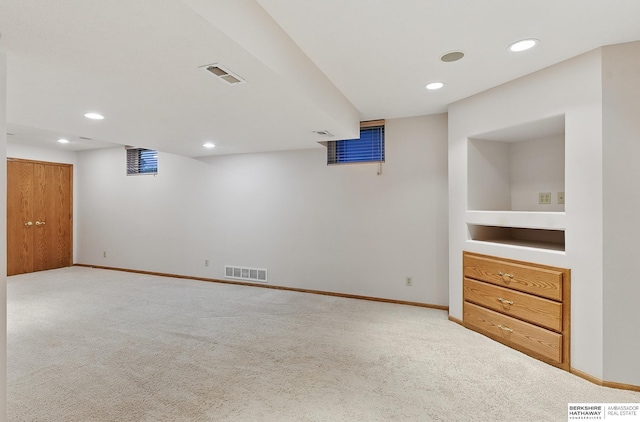 16712 V St, Omaha, NE 68135 - finished basement featuring carpet flooring, recessed lighting, and baseboards