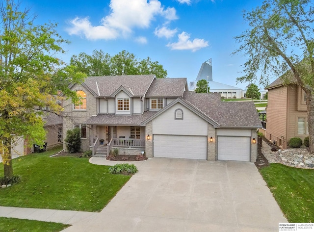 16712 V St, Omaha, NE 68135 - view of front of house with covered porch, an attached garage, driveway, a front yard, and roof with shingles