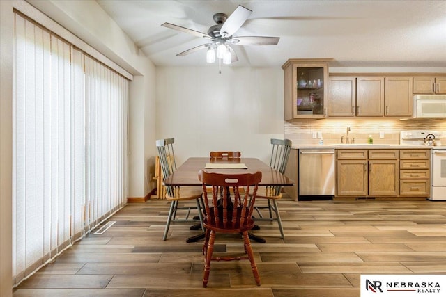 650 Heatherwood Dr, Fremont, NE 68025 - dining space with light wood-type flooring and a ceiling fan
