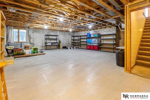 650 Heatherwood Dr, Fremont, NE 68025 - below grade area featuring stairs
