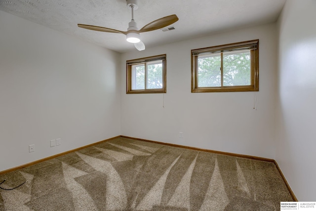15010 Normandy Blvd, Bellevue, NE 68123 - unfurnished room featuring carpet, baseboards, and ceiling fan