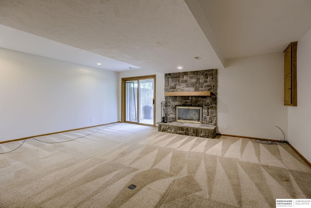 15010 Normandy Blvd, Bellevue, NE 68123 - unfurnished living room featuring carpet, baseboards, a fireplace, and a textured ceiling