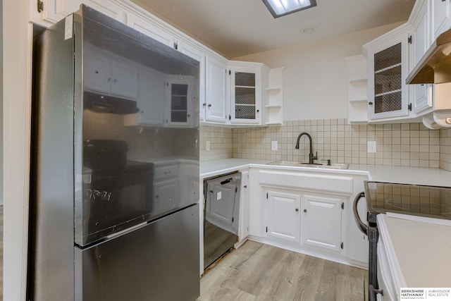 15010 Normandy Blvd, Bellevue, NE 68123 - kitchen with open shelves, dishwashing machine, a sink, light wood-style floors, and white cabinetry