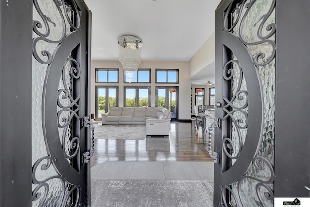 17380 S 77th Pt, Hickman, NE 68372 - foyer entrance with tile patterned flooring and a chandelier