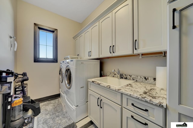 17380 S 77th Pt, Hickman, NE 68372 - laundry room featuring cabinet space, separate washer and dryer, and baseboards