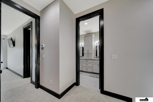 17380 S 77th Pt, Hickman, NE 68372 - corridor with light carpet and baseboards