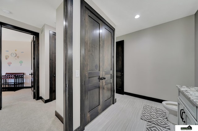 17380 S 77th Pt, Hickman, NE 68372 - hall with baseboards, light colored carpet, and recessed lighting