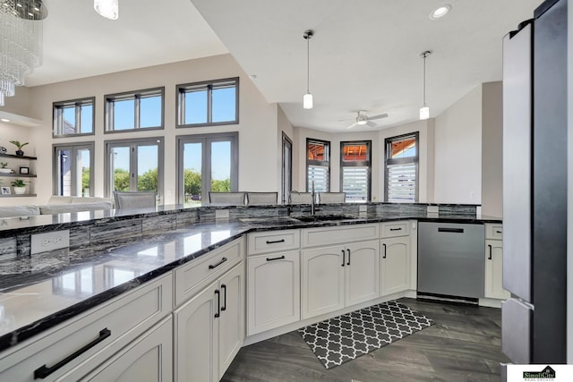 17380 S 77th Pt, Hickman, NE 68372 - kitchen featuring appliances with stainless steel finishes, healthy amount of natural light, open floor plan, ceiling fan, and recessed lighting