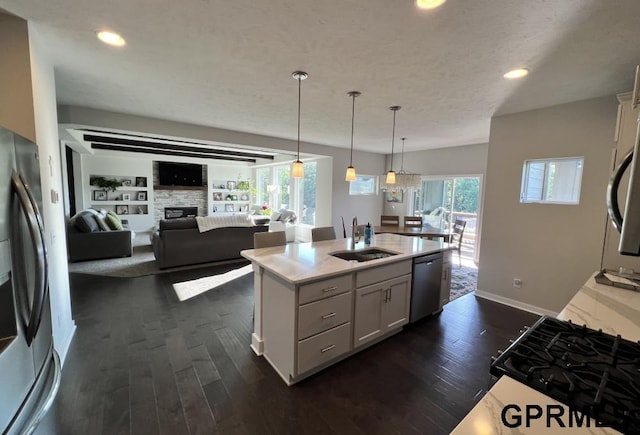 5815 S 238th St, Elkhorn, NE 68022 - kitchen with a sink, stainless steel appliances, recessed lighting, dark wood-type flooring, and light countertops