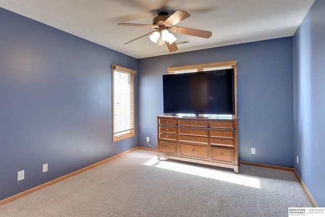 4804 Fountain Cir, Papillion, NE 68133 - carpeted bedroom with baseboards and a ceiling fan