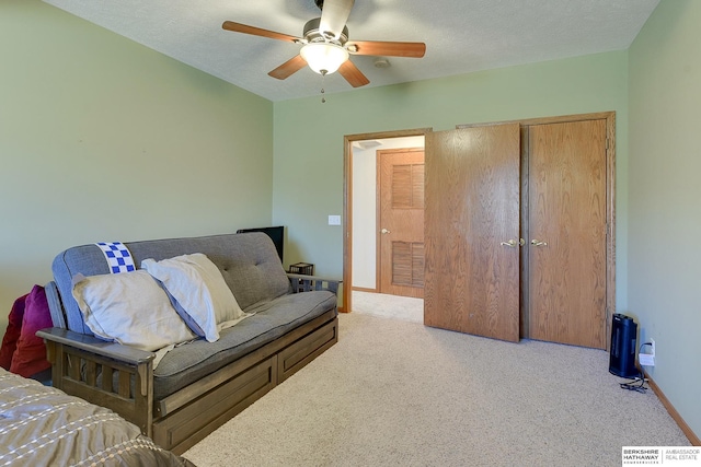 4804 Fountain Cir, Papillion, NE 68133 - bedroom featuring carpet floors, baseboards, a ceiling fan, and a closet