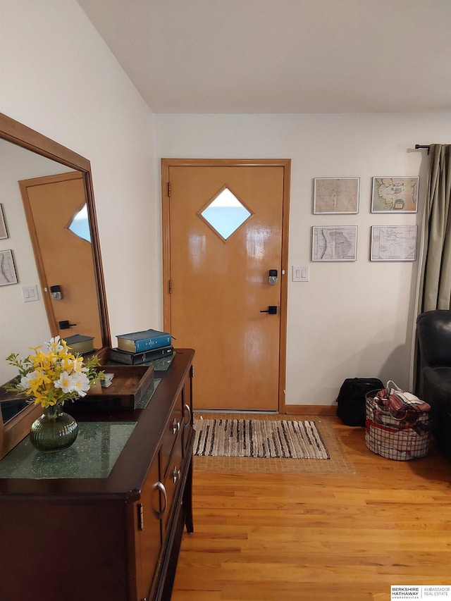 7027 S 39th Ave, Bellevue, NE 68147 - entryway featuring light wood-style flooring
