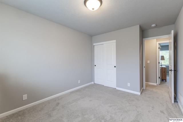 8111 S 198th St, Gretna, NE 68028 - unfurnished bedroom with baseboards, light colored carpet, and a closet