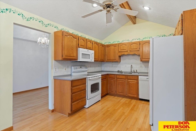 3412 Rahn Blvd, Bellevue, NE 68123 - kitchen featuring white appliances, light wood-type flooring, a sink, decorative backsplash, and brown cabinets