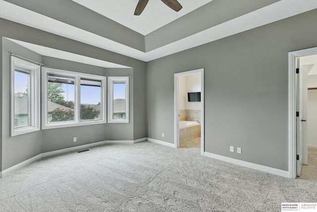 10022 S 177th St, Omaha, NE 68136 - unfurnished bedroom featuring carpet flooring, baseboards, a walk in closet, connected bathroom, and a ceiling fan
