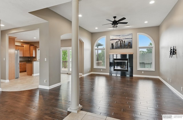 10022 S 177th St, Omaha, NE 68136 - unfurnished living room with light wood-style floors, healthy amount of natural light, a ceiling fan, and recessed lighting