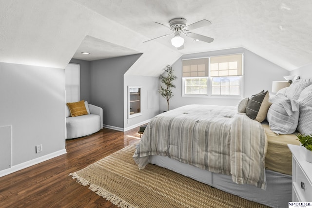 8207 Decatur St, Omaha, NE 68114 - bedroom featuring baseboards, vaulted ceiling, wood finished floors, ceiling fan, and a textured ceiling