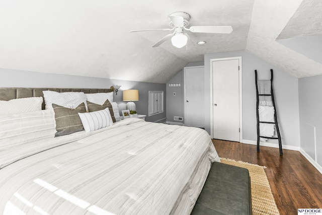 8207 Decatur St, Omaha, NE 68114 - bedroom featuring lofted ceiling, wood finished floors, baseboards, and a ceiling fan