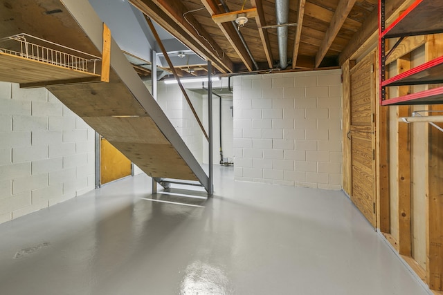8207 Decatur St, Omaha, NE 68114 - unfinished below grade area with concrete block wall and stairway