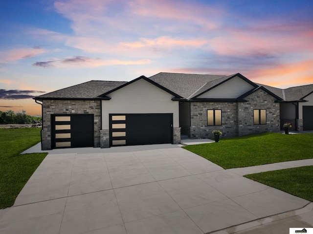 7949 Ponce Dr, Lincoln, NE 68516 - contemporary home with a garage, a front yard, concrete driveway, and roof with shingles