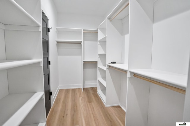 7949 Ponce Dr, Lincoln, NE 68516 - spacious closet featuring light wood finished floors