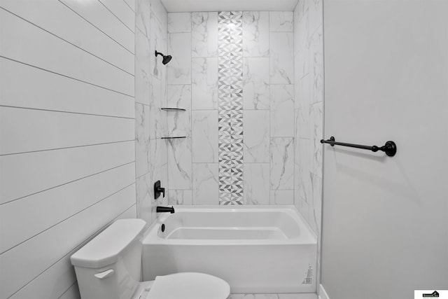 7949 Ponce Dr, Lincoln, NE 68516 - bathroom featuring toilet, shower / tub combination, and baseboards