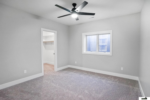 7949 Ponce Dr, Lincoln, NE 68516 - carpeted empty room featuring a ceiling fan and baseboards