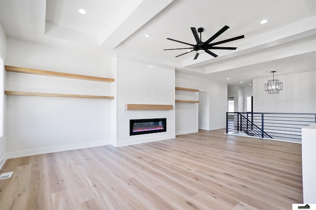7949 Ponce Dr, Lincoln, NE 68516 - unfurnished living room with light wood-style floors, a ceiling fan, baseboards, and recessed lighting