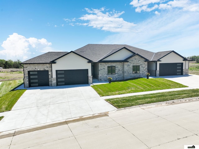 7949 Ponce Dr, Lincoln, NE 68516 - contemporary house featuring an attached garage, a front lawn, concrete driveway, stone siding, and a shingled roof