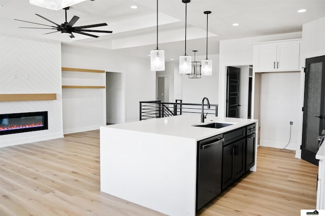 7949 Ponce Dr, Lincoln, NE 68516 - kitchen with a sink, dishwasher, light wood-type flooring, ceiling fan, and recessed lighting