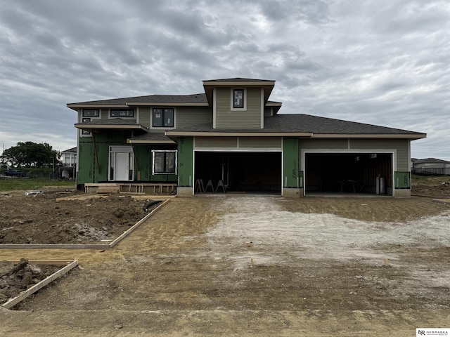 11505 S 116th St, Papillion, NE 68046 - view of front of home featuring roof with shingles and dirt driveway