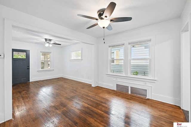 2740 N 49th St, Omaha, NE 68104 - unfurnished living room with a ceiling fan, dark wood finished floors, and baseboards