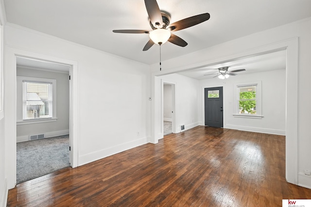 2740 N 49th St, Omaha, NE 68104 - empty room with ceiling fan, wood-type flooring, plenty of natural light, and ornamental molding