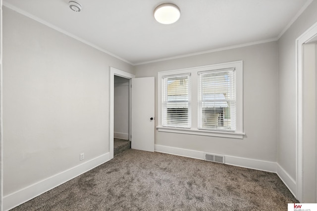 2740 N 49th St, Omaha, NE 68104 - unfurnished bedroom featuring carpet, ornamental molding, and baseboards