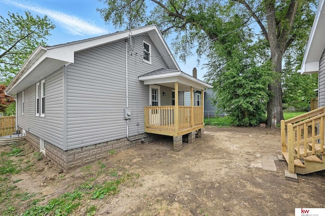 2740 N 49th St, Omaha, NE 68104 - view of front facade with a wooden deck