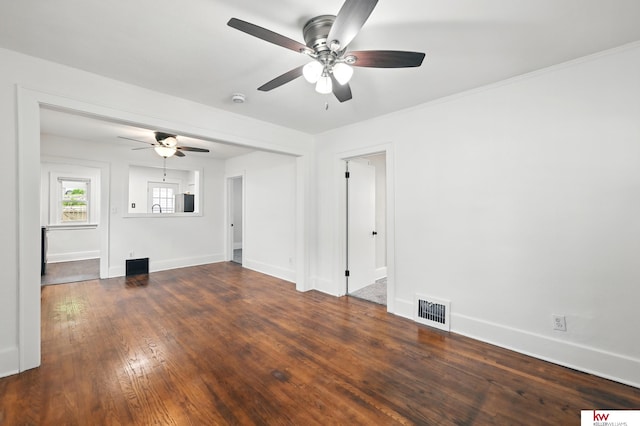 2740 N 49th St, Omaha, NE 68104 - unfurnished living room featuring ceiling fan, baseboards, and wood finished floors