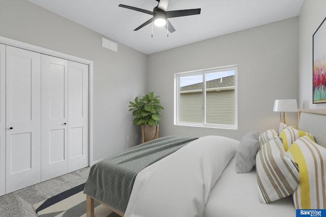 5956 Loxton St, Lincoln, NE 68526 - bedroom with carpet flooring, a closet, and a ceiling fan