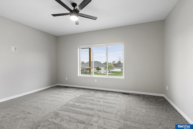 5956 Loxton St, Lincoln, NE 68526 - empty room featuring carpet, ceiling fan, and baseboards