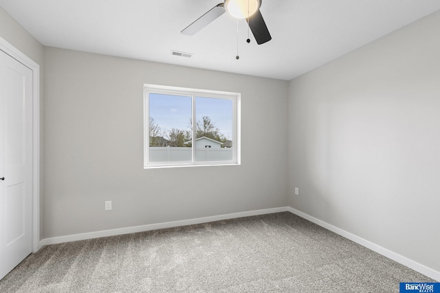 5956 Loxton St, Lincoln, NE 68526 - spare room with carpet, a ceiling fan, and baseboards