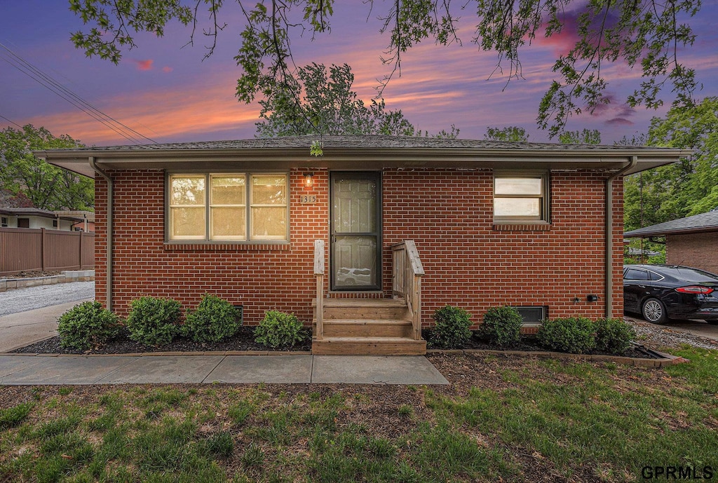 1315 Irving St, Lincoln, NE 68521 - bungalow-style house with brick siding