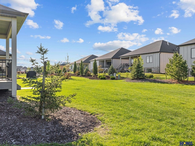 9750 Casa Galeano Ct, Lincoln, NE 68520 - view of green lawn with a residential view